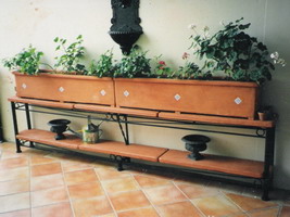 mediterranean style planter on custom steel frame, aged terracotta semi formal finish