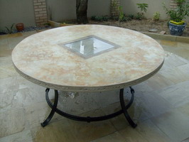 Custom round garden table, Mottle Ivory rust finish & slump glass centre panel, on wrought iron base